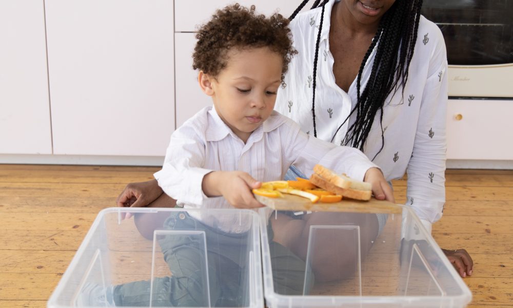 Mother and Child Throwing Trash