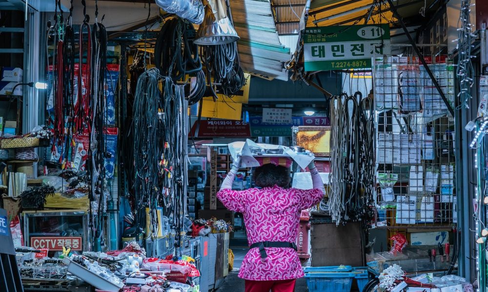 woman walking on alley in South Korea