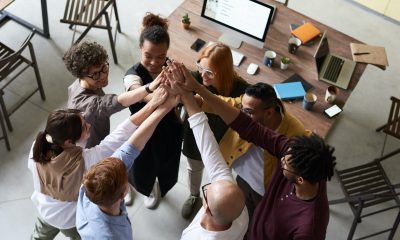 Photo Of People Holding Each Other's Hands