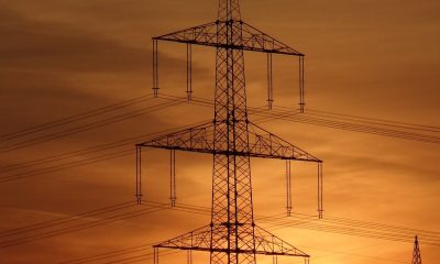 electric lines with sunset on background