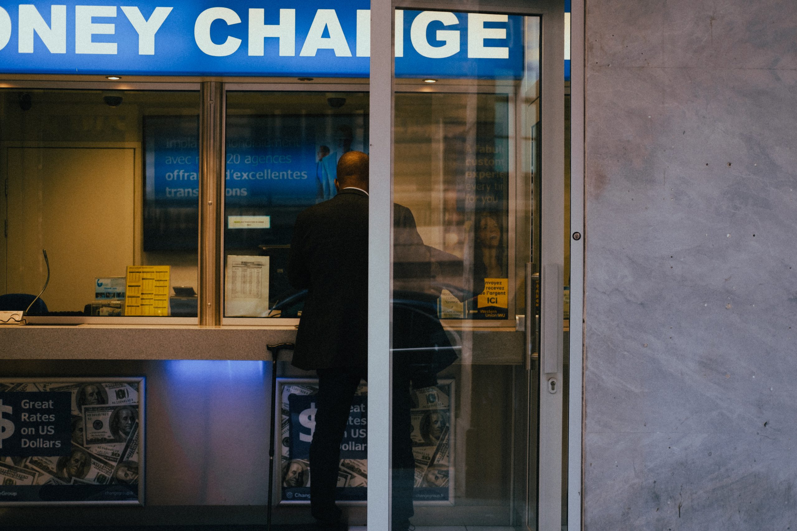 Man Exchanging Money