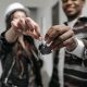 couple holding house key