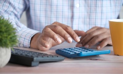 hands using calculator