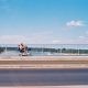 man driving along road