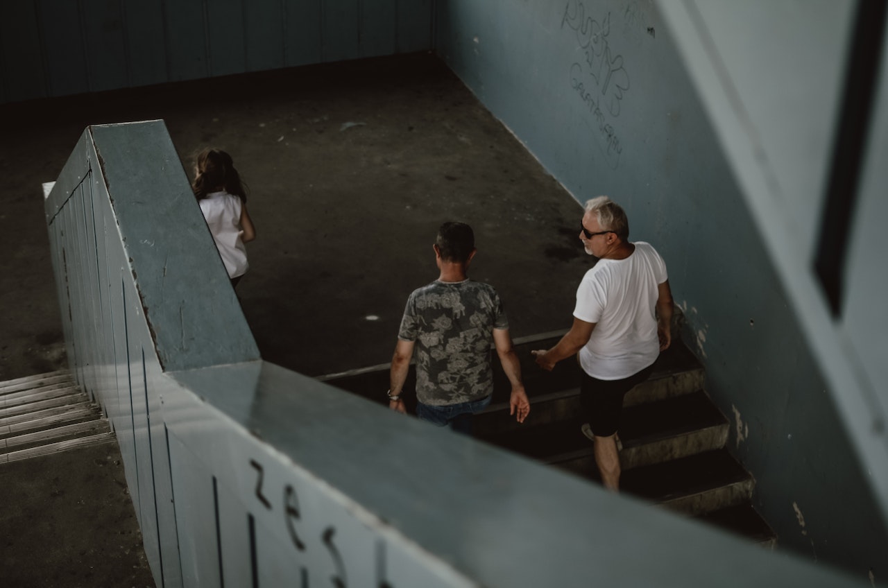 men walking on stairs