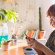 woman smiling on her phone