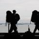 silhouette of soldiers walking