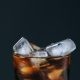 ice cubes and soft drink on glass