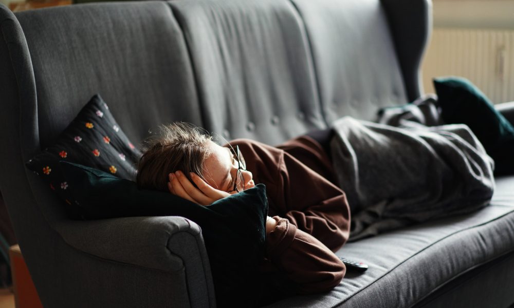 lying on sofa