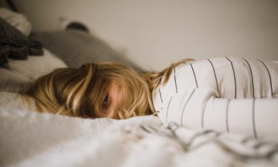 woman lying on bed