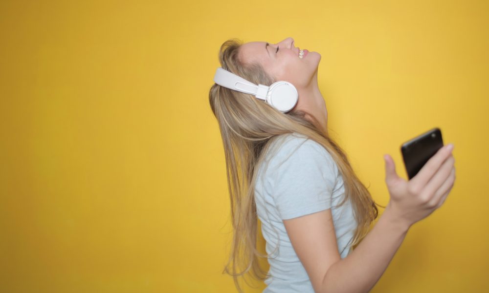 Photo of Woman Listening To Music