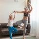 A Grandmother and Granddaughter Exercising at Home