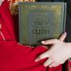 Person Holding A Holy Quran Book