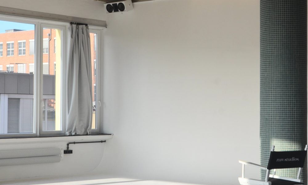 Spacious light studio with chair