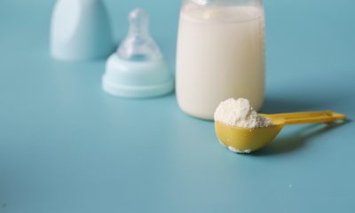 A Close-Up Shot of a Scooped Formula Milk Powder