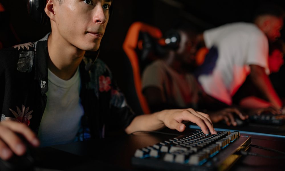 Close-up of a Man Playing Computer