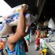 man carrying sack of rice