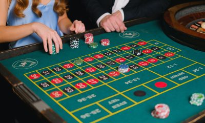 A Person Holding Casino Chips