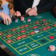 A Person Holding Casino Chips