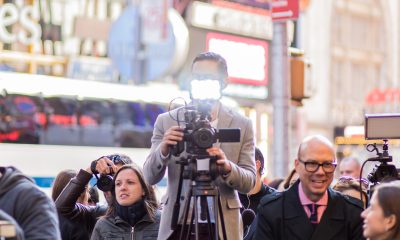 Journalists Standing Behind Barrier