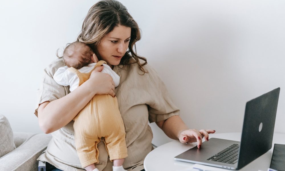 mother and child in front of laptop