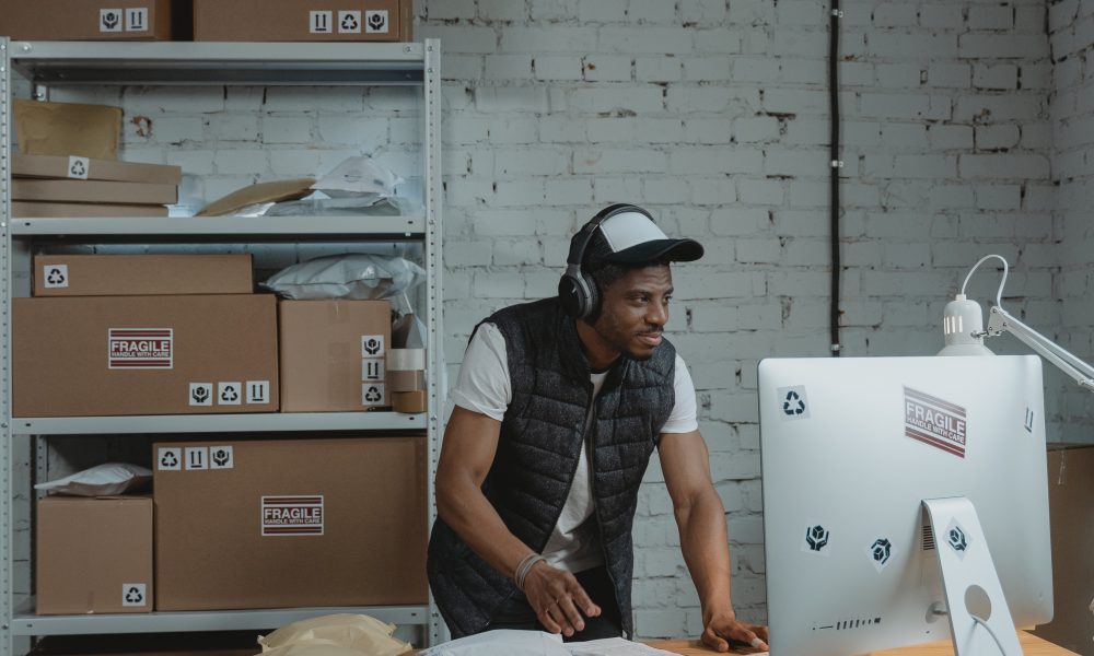 Man in Black Vest and Wearing a Headphones