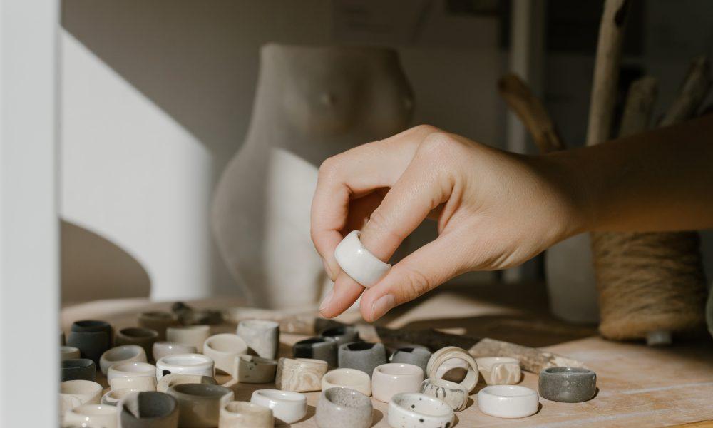 A Person with a Ceramic Ring on Finger