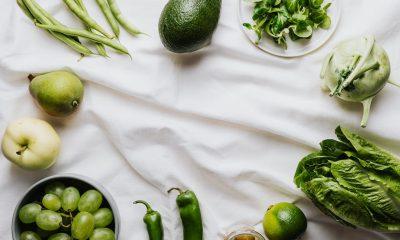 Green Vegetables and Fruits on a White Surface