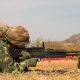 soldier aiming riffle