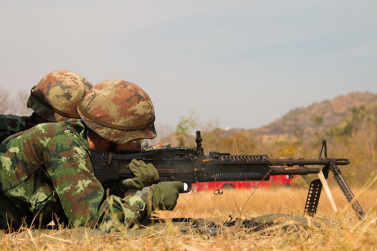 soldier aiming riffle