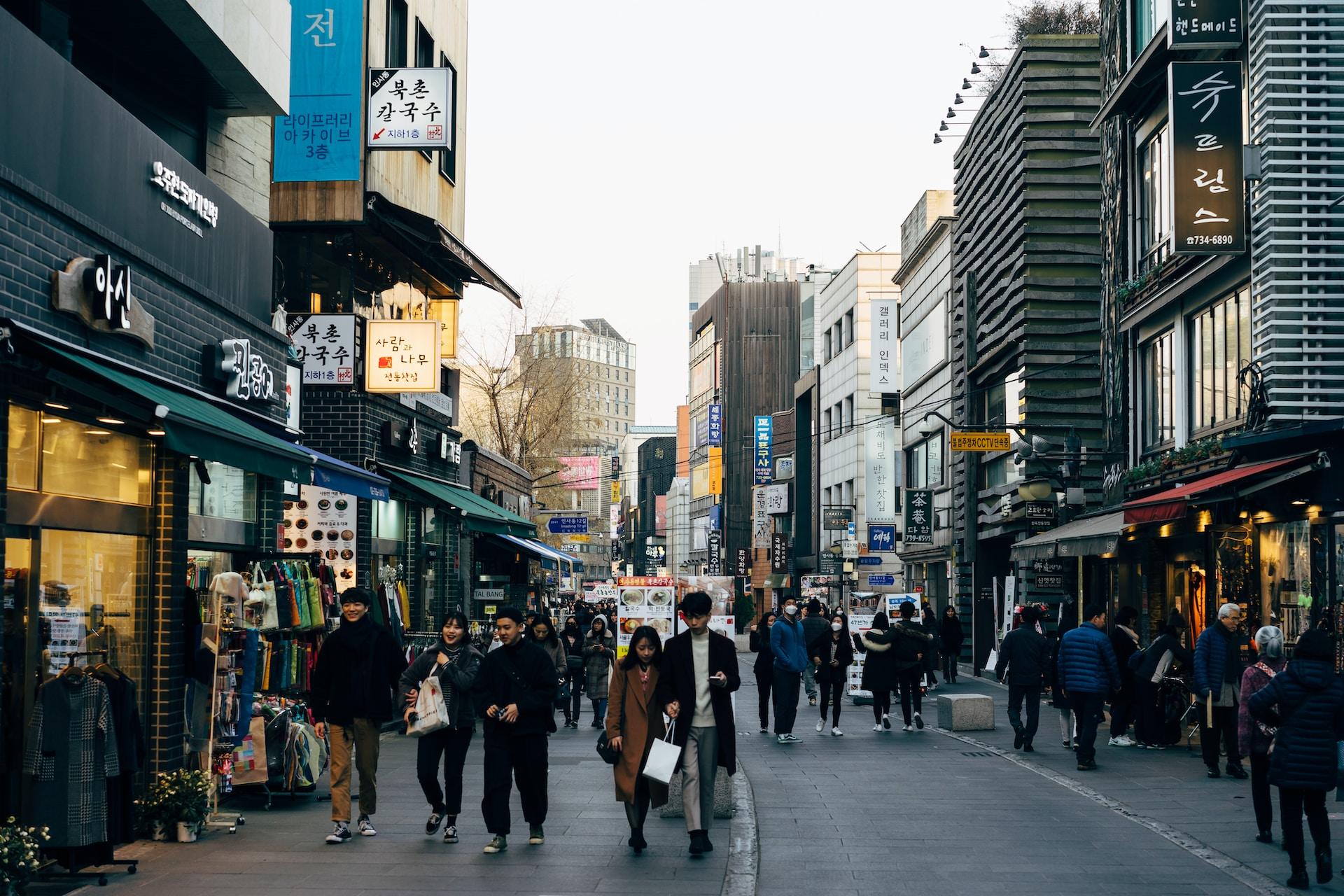 people walking in seoul