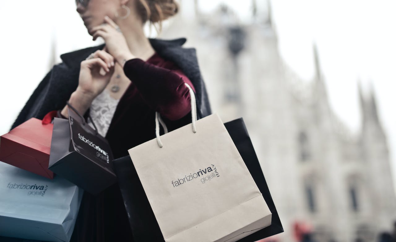 woman holding shopping bags