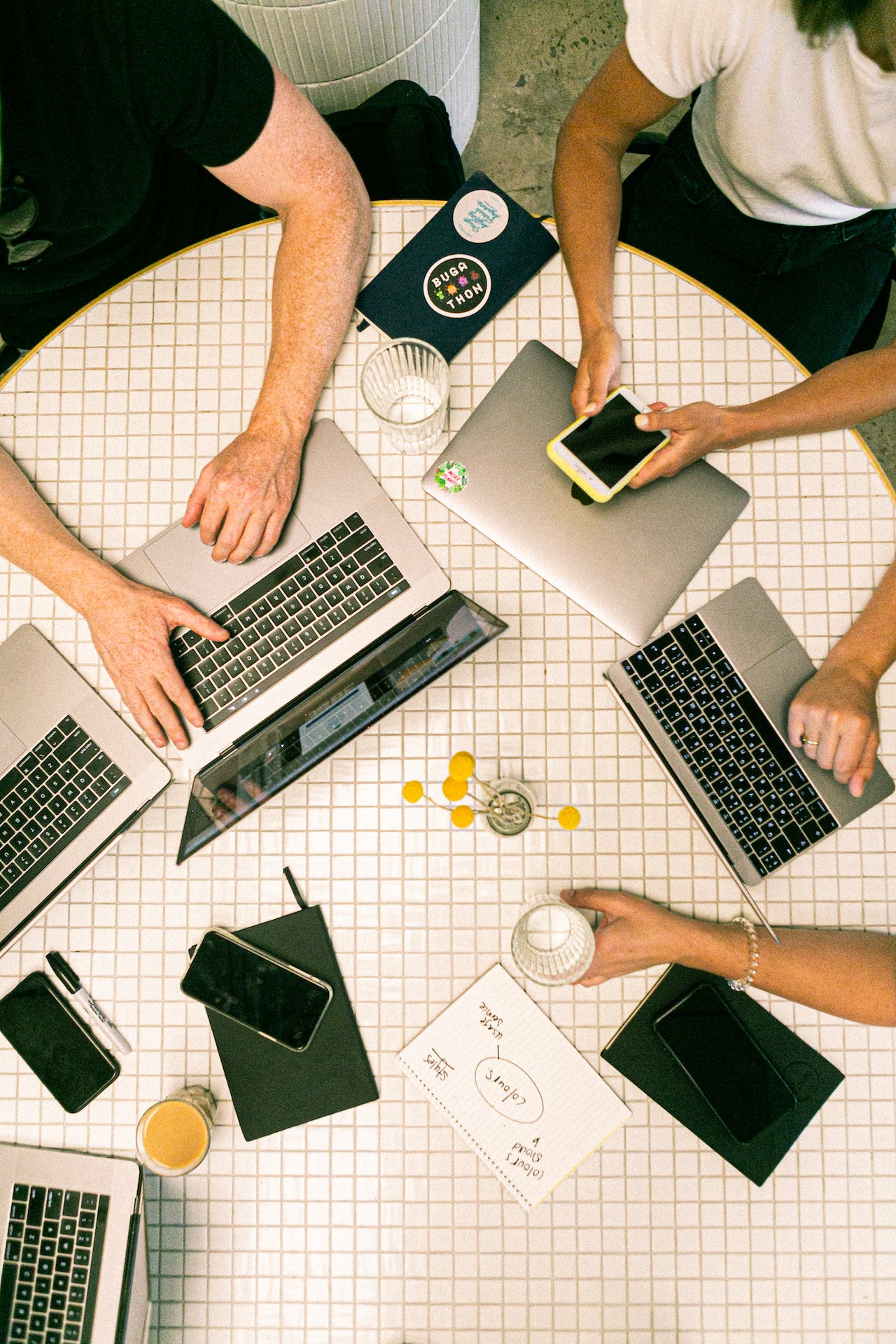 laptops phones on table