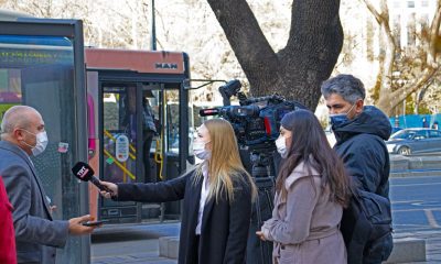 A Reporter Interviewing a Man