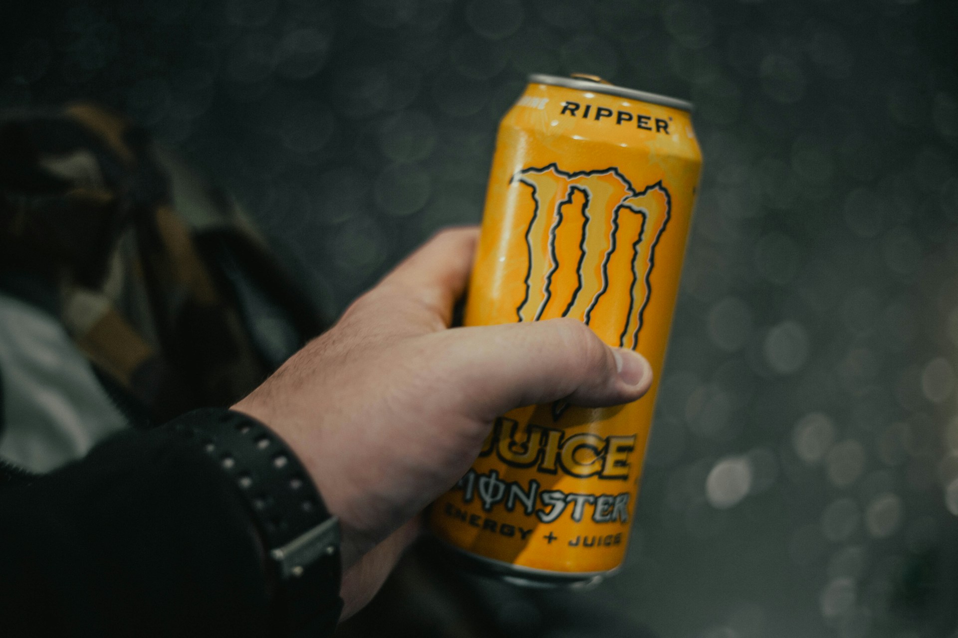 hand holding energy drink