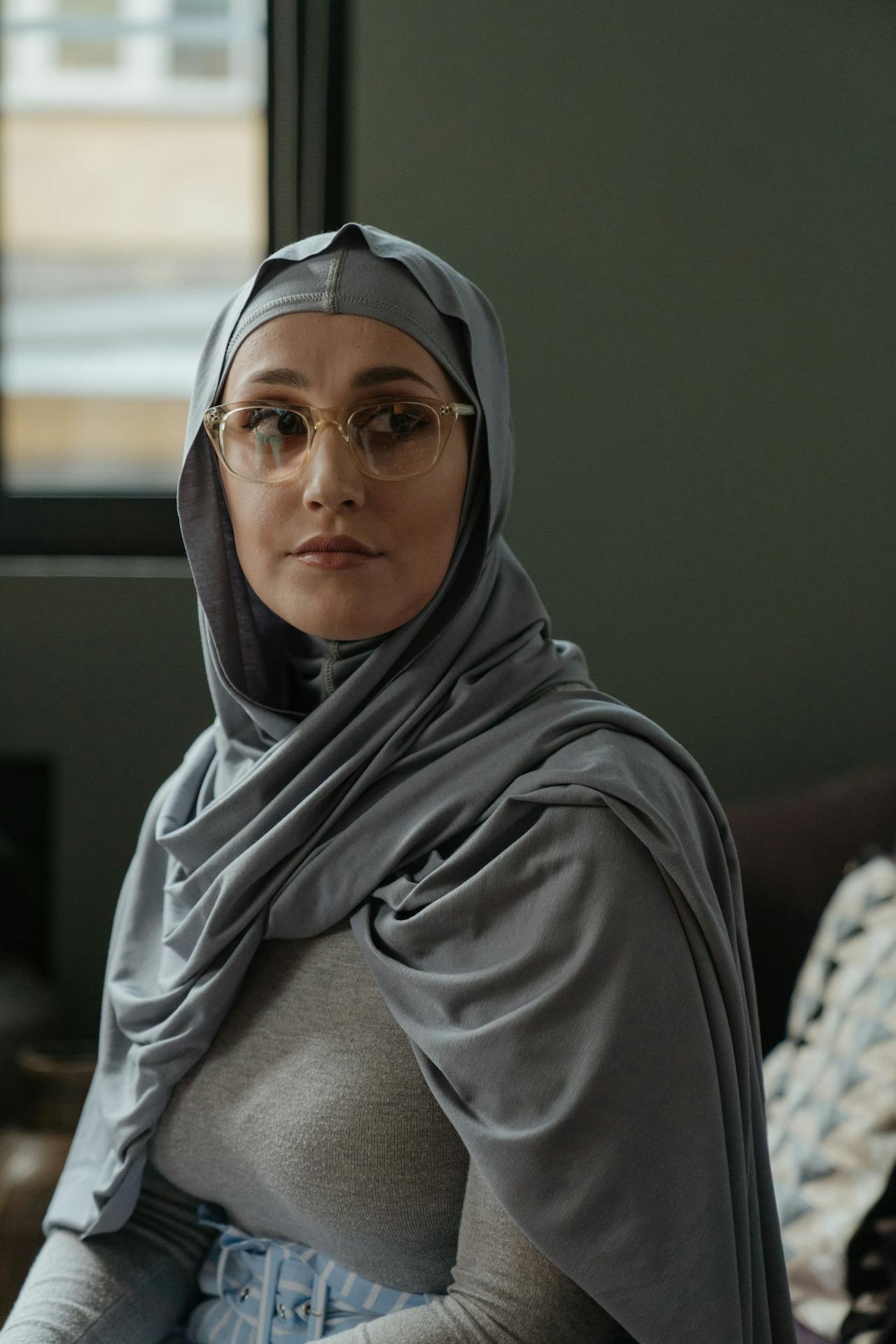 Woman in Gray Hijab and Gray Long Sleeve Shirt