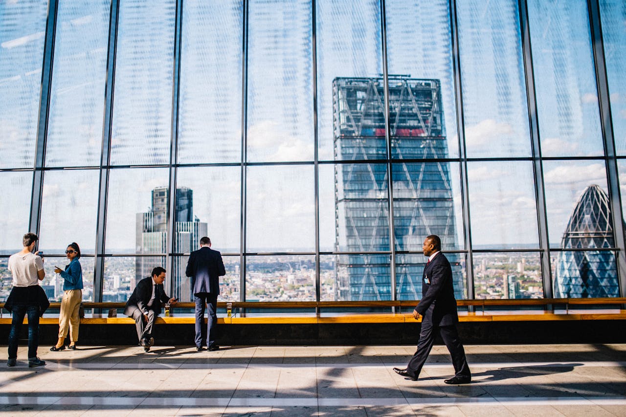 people in a building wearing corporate attire