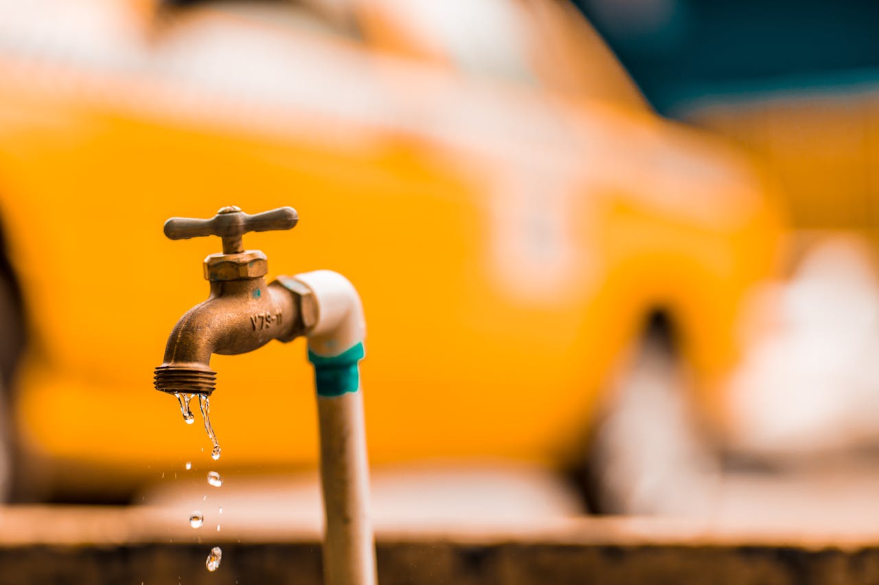 water drops from faucet