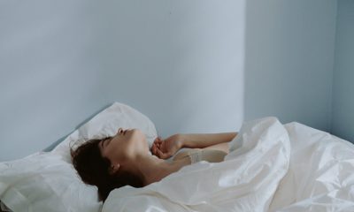 woman sleeping on bed