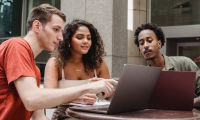 group discussing over laptop