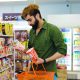 Man Buying Cup Noodles