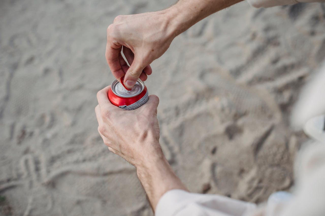 opening can of drink