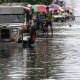 jeepney in the middle of the flood