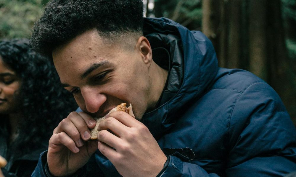 man eating sandwich