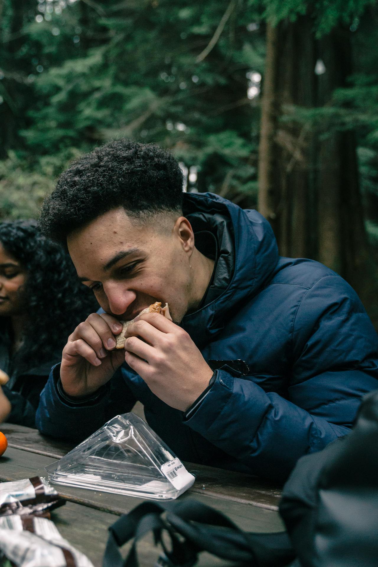 man eating sandwich