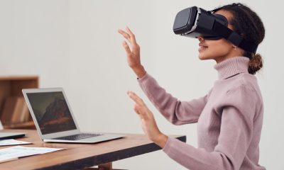 woman using VR goggles