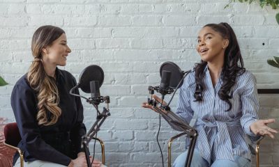 Positive black woman talking to radio host