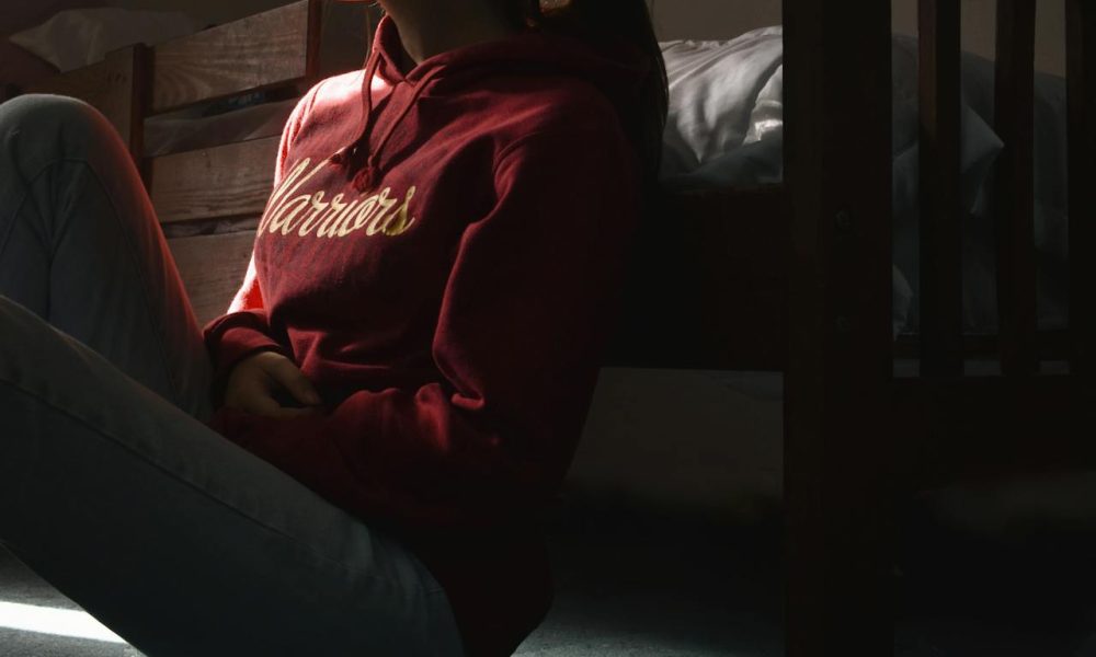 woman sitting on the floor