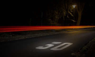 Time Lapse Photography of Red and Orange Light on Road With 30 Print on Nighttime