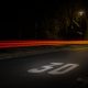 Time Lapse Photography of Red and Orange Light on Road With 30 Print on Nighttime
